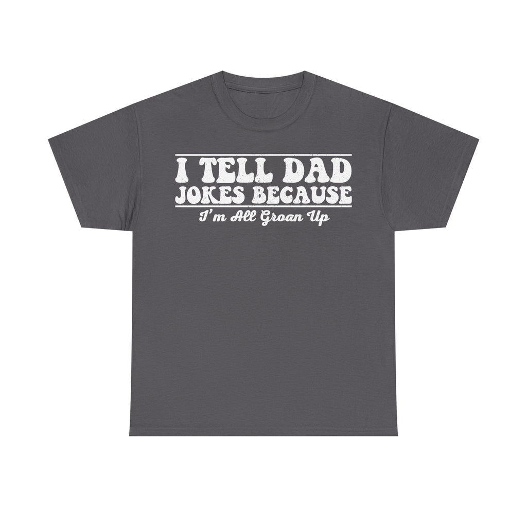 T-shirt in charcoal gray with white distressed vintage typography reading I TELL DAD JOKES BECAUSE I'M ALL GROWN UP.