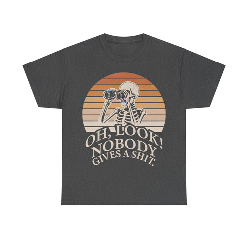 T-shirt with skeleton and binoculars over a retro orange sunset, featuring Oh Look Nobody Gives A Shit on a dark gray tee.
