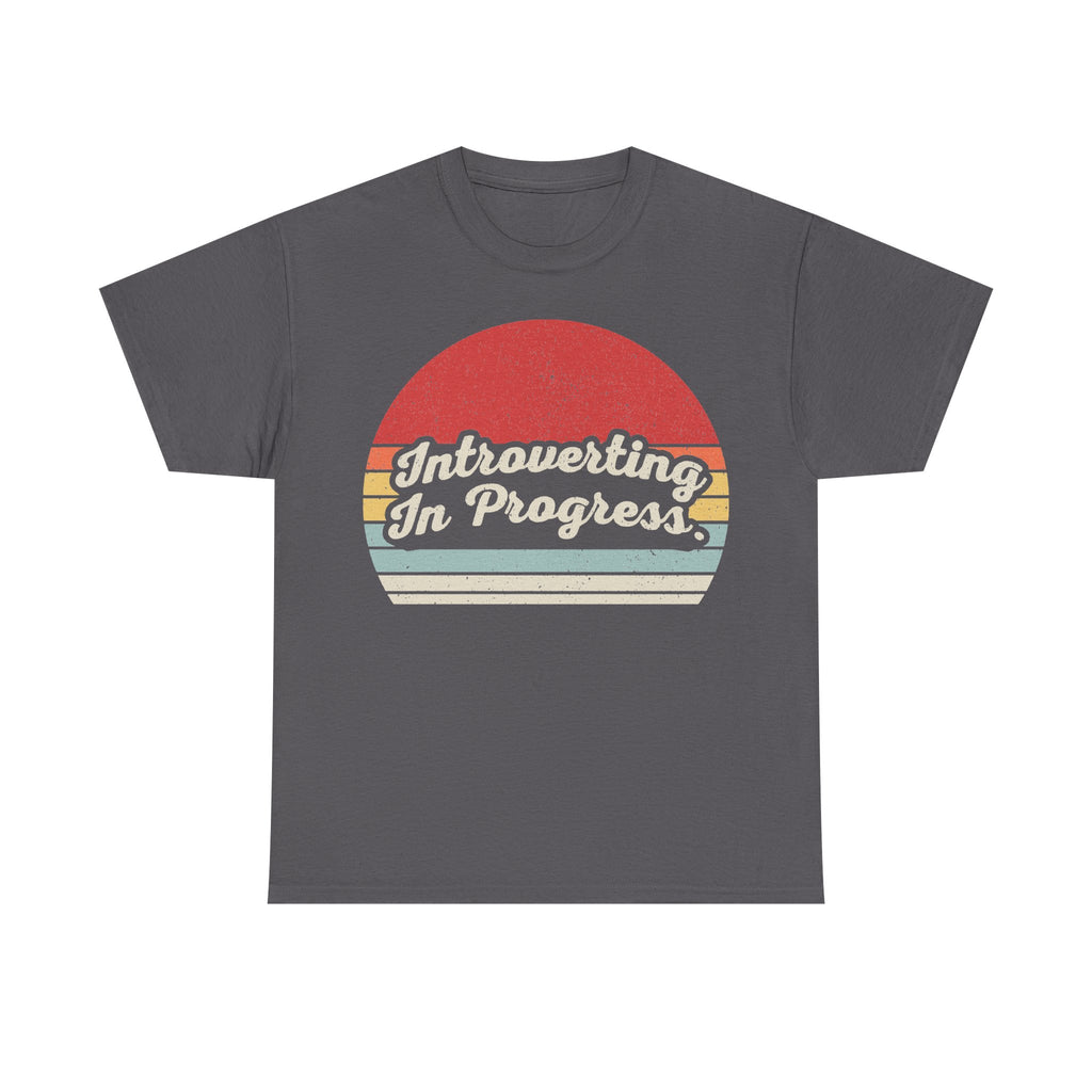 Dark gray T-shirt featuring a retro sunset circle with pastel stripes and Introverting In Progress text.
