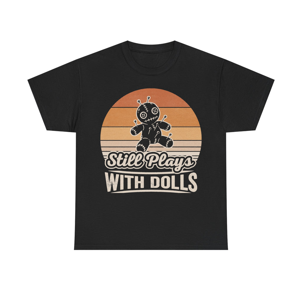 Black T-shirt with retro sunset graphic featuring a stitched voodoo doll and the phrase Still Plays With Dolls