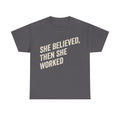 T-shirt, grey, bold cream text SHE BELIEVED, THEN SHE WORKED across the front of the shirt