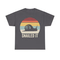 T-shirt with retro snail graphic and sunset rainbow stripes, featuring the text SNAILED IT on a dark gray shirt