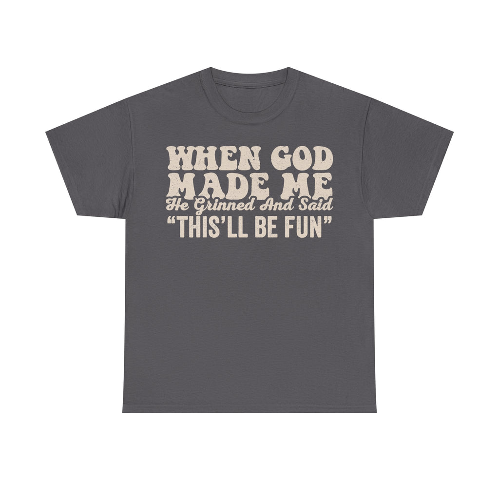 Gray T-shirt with cream vintage text reading WHEN GOD MADE ME; He Grinned And Said "THIS'LL BE FUN"