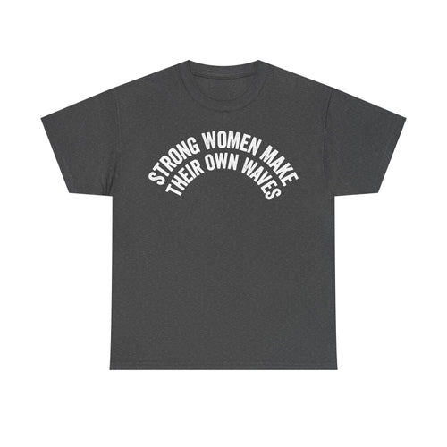 T-shirt featuring a white circular slogan STRONG WOMEN MAKE THEIR OWN WAVES on a dark heather gray tee with bold typography.