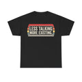 Black T-shirt with a retro badge graphic and multicolor stripes reading LESS TALKING MORE EXISTING.