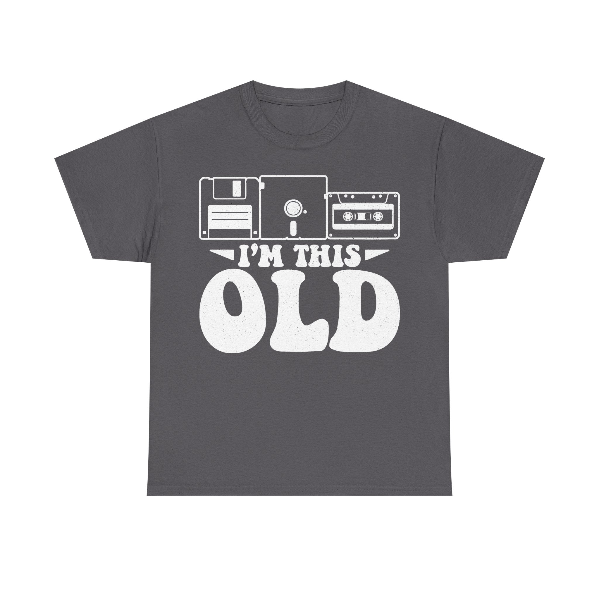 Dark gray T-shirt with white vintage tech graphic featuring floppy disk, cassette, VHS, and bold I’M THIS OLD typography.