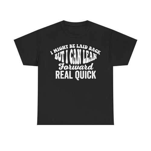 Black T-shirt with bold retro curved white typography reading I MIGHT BE LAID BACK BUT I CAN LEAN FORWARD REAL QUICK