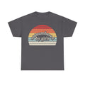 T-shirt, dark gray, retro sunset circle graphic in warm stripes with the text outnumbered by girls.