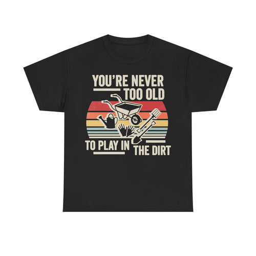 Black t-shirt with beige retro typography and a colorful striped panel showing gardening tools illustration.