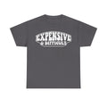 T-shirt on dark gray fabric featuring white distressed badge text EXPENSIVE & DIFFICULT