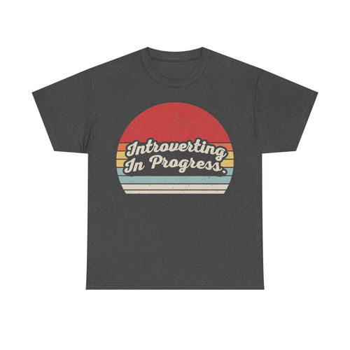 T-shirt on dark heather gray with retro sunset stripes and Introverting In Progress script text.