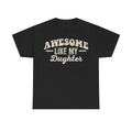 T-shirt on black fabric with distressed cream typography reading Awesome Like My Daughter; dad shirt