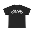 Black T-shirt with white distressed text: Bad Puns. That's How Eye Roll.