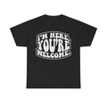 T-shirt black with bold distressed typography featuring the exact quote I'm Here You're Welcome on the front.