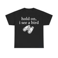 T-shirt, black, with white distressed typography hold on, i see a bird and a binoculars illustration