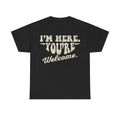 T‑Shirt with bold distressed vintage script text on black: I'm Here. You're Welcome.