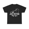 Black T-shirt with white distressed graphic of a lounging figure and the bold text Just Resting My Eyes