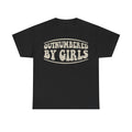 Black T-shirt with cream vintage curved text OUTNUMBERED BY GIRLS — retro feminist graphic tee.