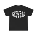 Black T-shirt with white distressed curved lettering reading Put It On My Dad's Tab in a retro vintage style.