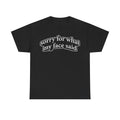 Black T-shirt with white retro-style typography reading sorry for what my face said