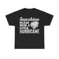 T-shirt, black with white distressed typography reading Sunshine Mixed With A Little Hurricane and a wave illustration.