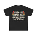 Black T-shirt with vintage rainbow frame and bold lettering reading When God Made Me He Grinned And Said This'll Be Fun